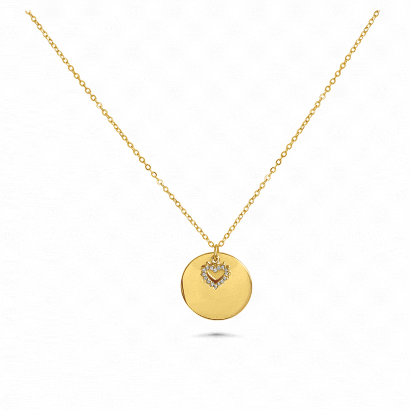 Engraved necklace with round charm and rhinestone heart