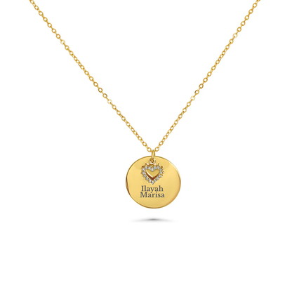 Engraved necklace with round charm and rhinestone heart
