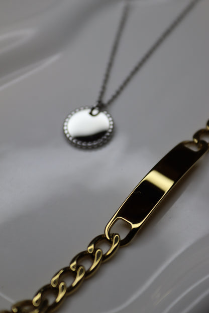 Engraved bracelet with golden bar